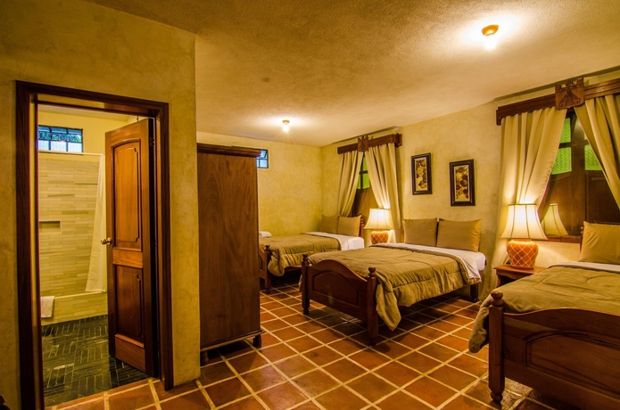 Imagen de la habitación del Hotel El Carmen Suites. Foto 3