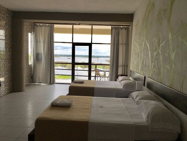 Imagen de la habitación del Hotel El Cauchero. Foto 6