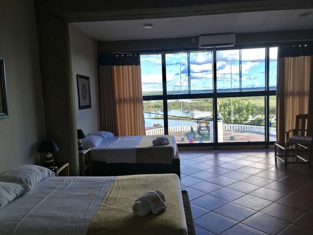 Imagen de la habitación del Hotel El Cauchero. Foto 7