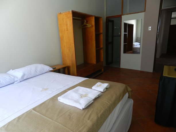 Imagen de la habitación del Hotel El Cauchero. Foto 13