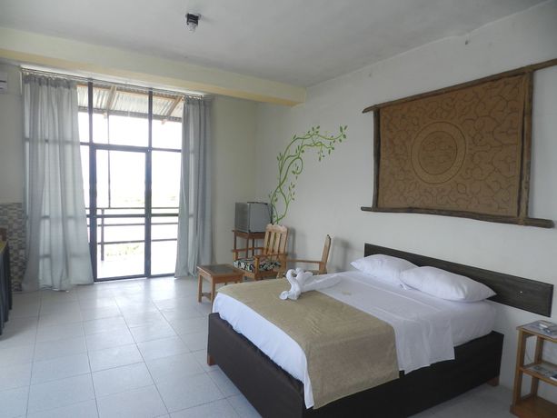 Imagen de la habitación del Hotel El Cauchero. Foto 14