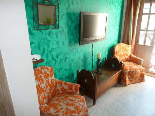 Imagen de la habitación del Hotel El Chili Boutique. Foto 10