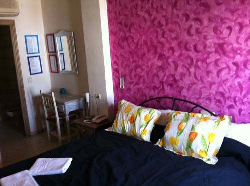 Imagen de la habitación del Hotel El Chili Boutique. Foto 11