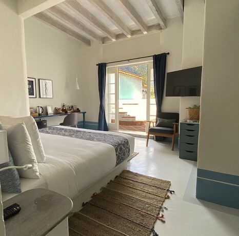 Imagen de la habitación del Hotel El Ciruelo. Foto 20