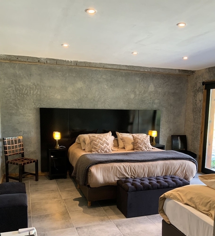 Imagen de la habitación del Hotel El Condor Pasa VLA. Foto 5