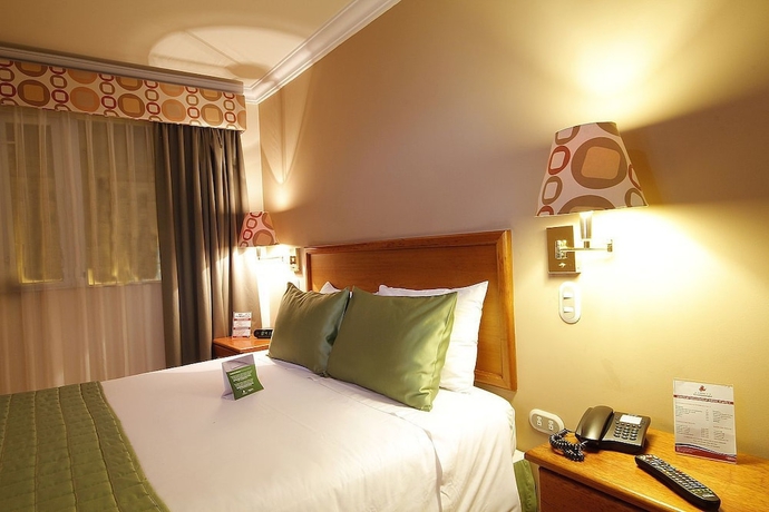 Imagen de la habitación del Hotel El Conquistador, Cuenca. Foto 11