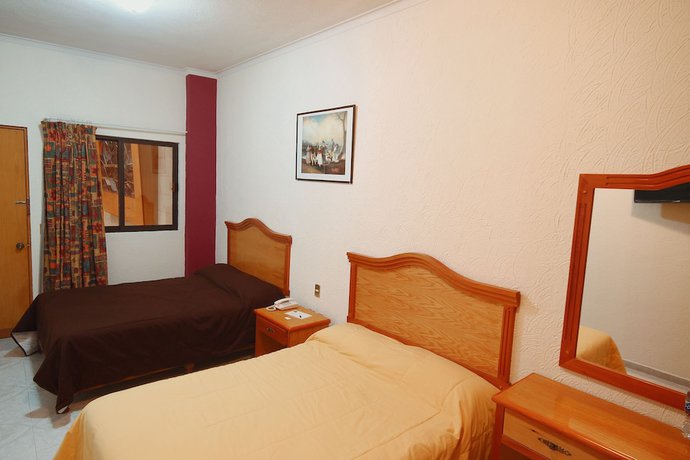 Imagen de la habitación del Hotel El Conquistador Monarca. Foto 8