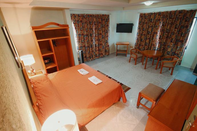 Imagen de la habitación del Hotel El Conquistador Monarca. Foto 9