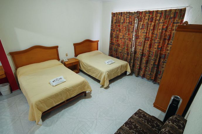 Imagen de la habitación del Hotel El Conquistador Monarca. Foto 10