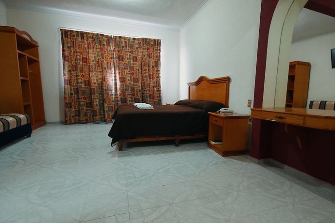 Imagen de la habitación del Hotel El Conquistador Monarca. Foto 13