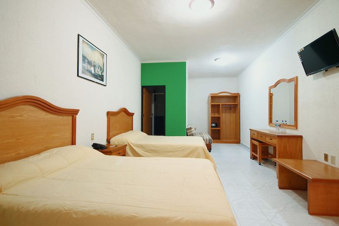 Imagen de la habitación del Hotel El Conquistador Monarca. Foto 15