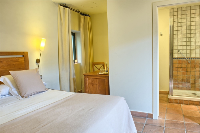 Imagen de la habitación del Hotel El Convent De Begur. Foto 3