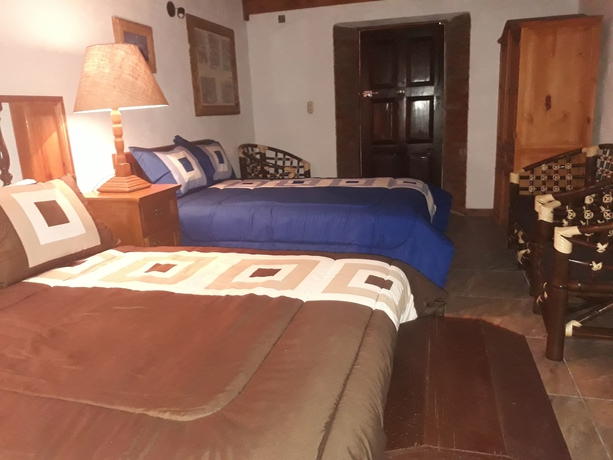 Imagen de la habitación del Hotel El Cristo. Foto 7