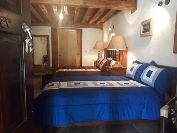 Imagen de la habitación del Hotel El Cristo. Foto 8