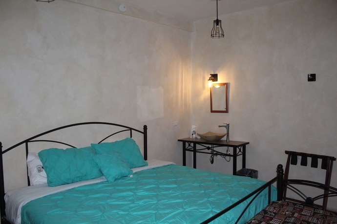 Imagen de la habitación del Hotel El Descanso Barrio del Artista. Foto 6