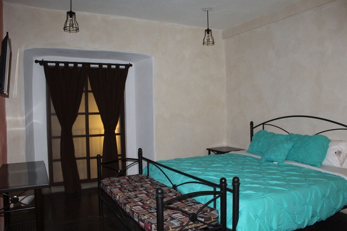 Imagen de la habitación del Hotel El Descanso Barrio del Artista. Foto 13