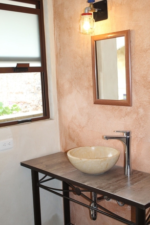 Imagen de la habitación del Hotel El Descanso Barrio del Artista. Foto 17