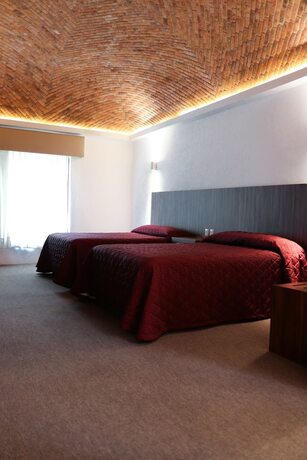 Imagen de la habitación del Hotel El Diezmo. Foto 18