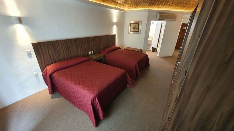 Imagen de la habitación del Hotel El Diezmo. Foto 20