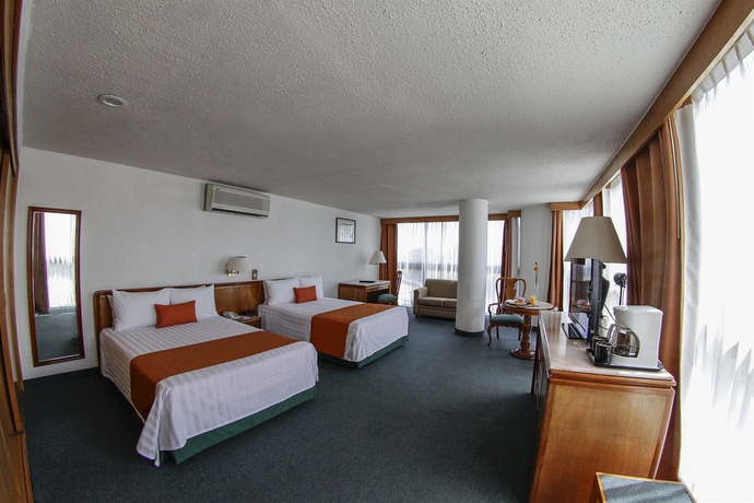 Imagen de la habitación del Hotel El Diplomatico. Foto 7