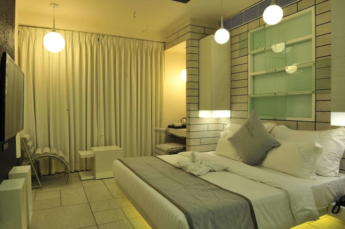 Imagen de la habitación del Hotel El Dorado, Ahmedabad. Foto 4