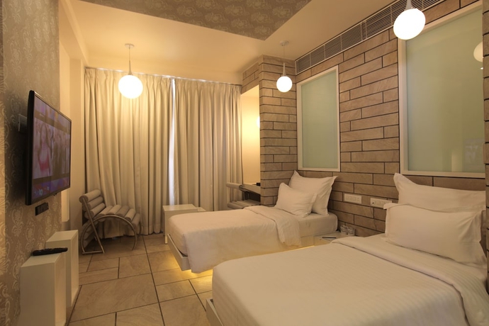 Imagen de la habitación del Hotel El Dorado, Ahmedabad. Foto 8