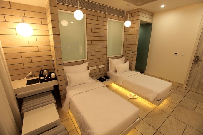 Imagen de la habitación del Hotel El Dorado, Ahmedabad. Foto 14