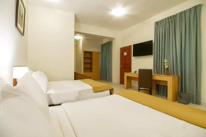 Imagen de la habitación del Hotel El Dorado Express. Foto 14