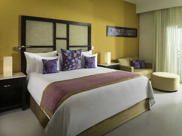 Imagen de la habitación del Hotel El Dorado Seaside Palms. Foto 12