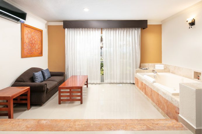 Imagen de la habitación del Hotel El Dorado Seaside Palms. Foto 20