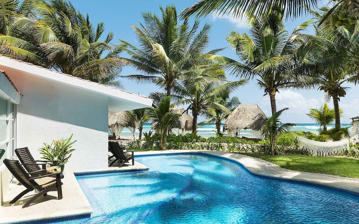 Imagen de la habitación del Hotel El Dorado Seaside Suites Resort and Spa. Foto 9