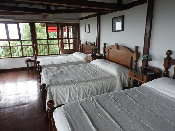 Imagen de la habitación del Hotel El Eden Country. Foto 11