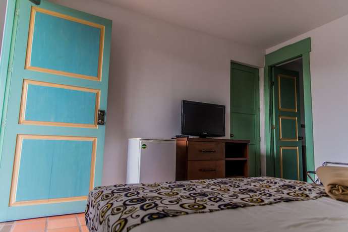 Imagen de la habitación del Hotel El Eden Parque Del Cafe. Foto 7