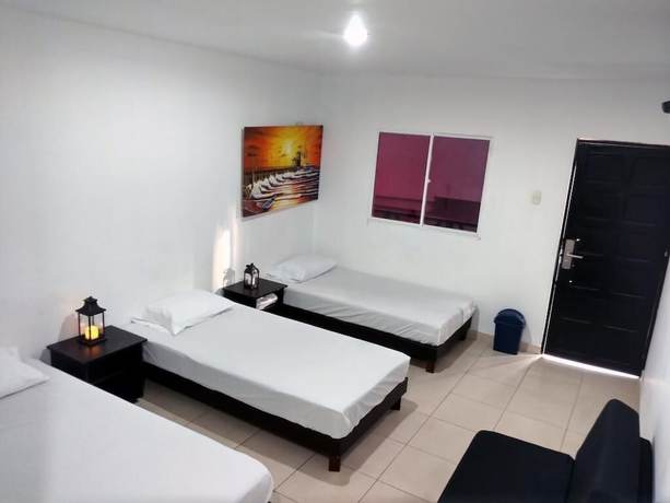 Imagen de la habitación del Hotel El Emigrante, Puerto Colombia. Foto 7