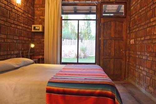 Imagen de la habitación del Hotel El Encuentro En Chacras De Coria. Foto 37