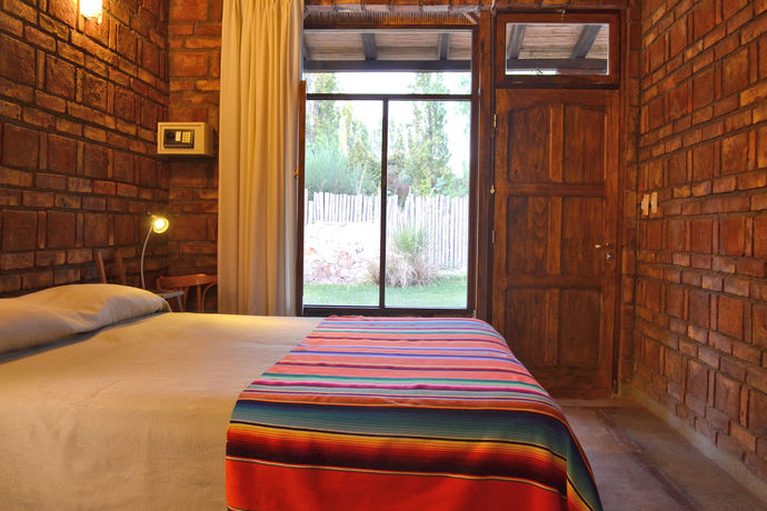 Imagen de la habitación del Hotel El Encuentro Posada Boutique. Foto 10
