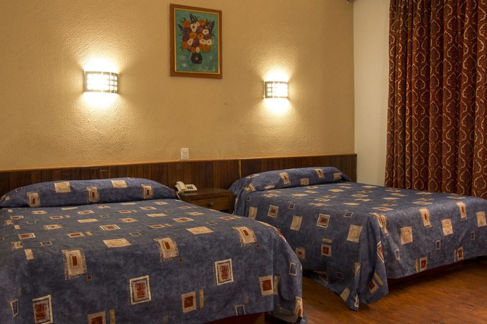 Imagen de la habitación del Hotel El Estadio. Foto 13