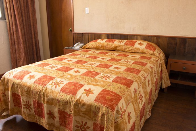 Imagen de la habitación del Hotel El Estadio. Foto 15