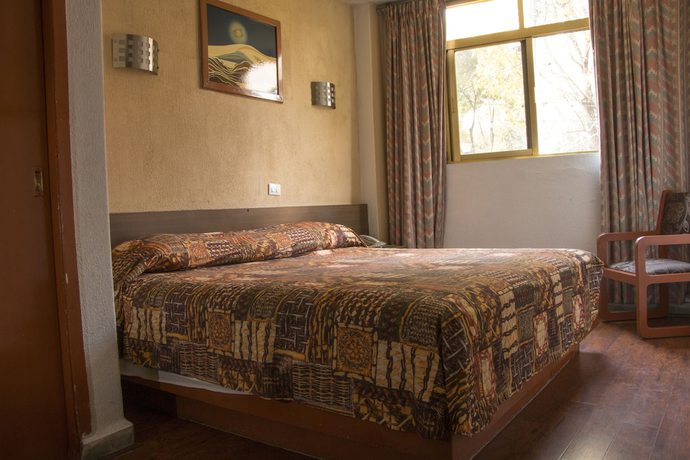 Imagen de la habitación del Hotel El Estadio. Foto 18