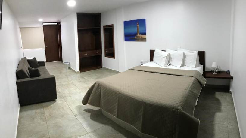 Imagen de la habitación del Hotel El Faro Buga. Foto 9