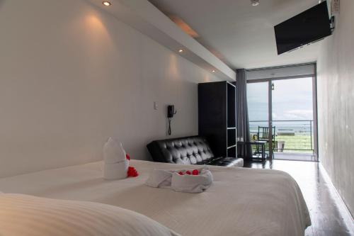 Imagen de la habitación del Hotel El Faro Containers Beach. Foto 5