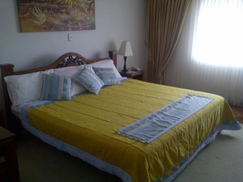 Imagen de la habitación del Hotel El Faro Del 18. Foto 6