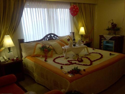 Imagen de la habitación del Hotel El Faro Del 18. Foto 8