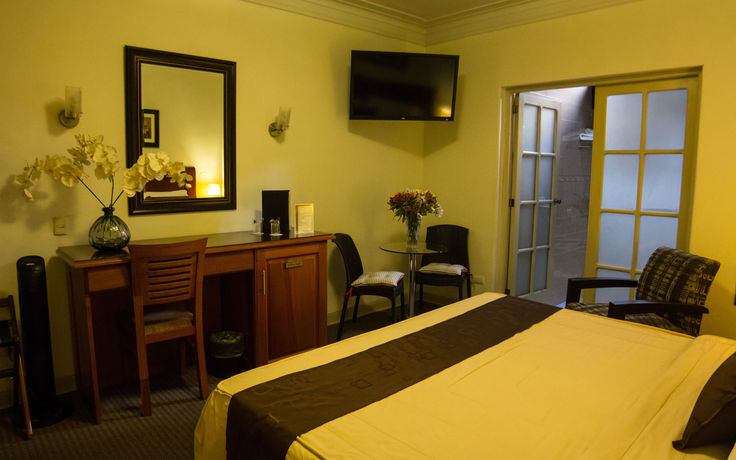 Imagen de la habitación del Hotel El Faro Inn. Foto 11