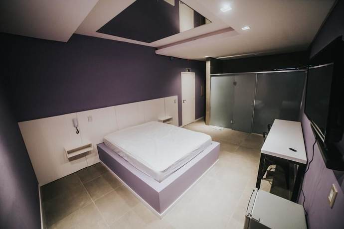 Imagen de la habitación del Hotel El Fuego Su&iacute;tes Motel. Foto 6