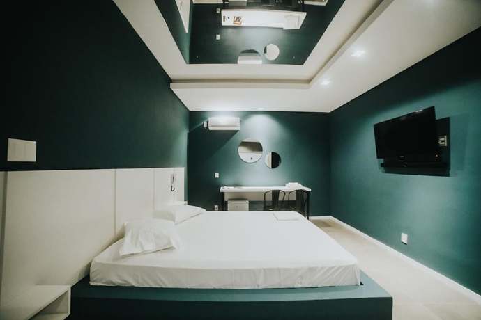 Imagen de la habitación del Hotel El Fuego Su&iacute;tes Motel. Foto 7