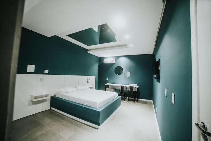 Imagen de la habitación del Hotel El Fuego Su&iacute;tes Motel. Foto 8