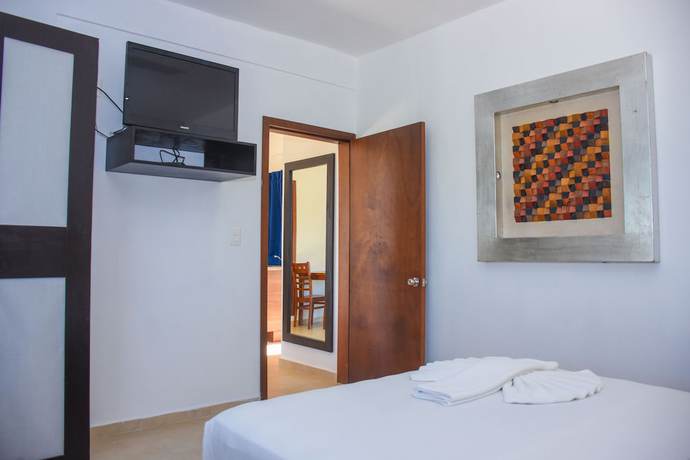 Imagen de la habitación del Hotel El Fuerte Beach Resort. Foto 2