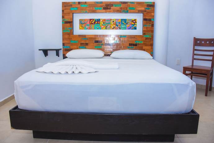Imagen de la habitación del Hotel El Fuerte Beach Resort. Foto 4