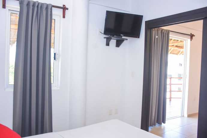 Imagen de la habitación del Hotel El Fuerte Beach Resort. Foto 5